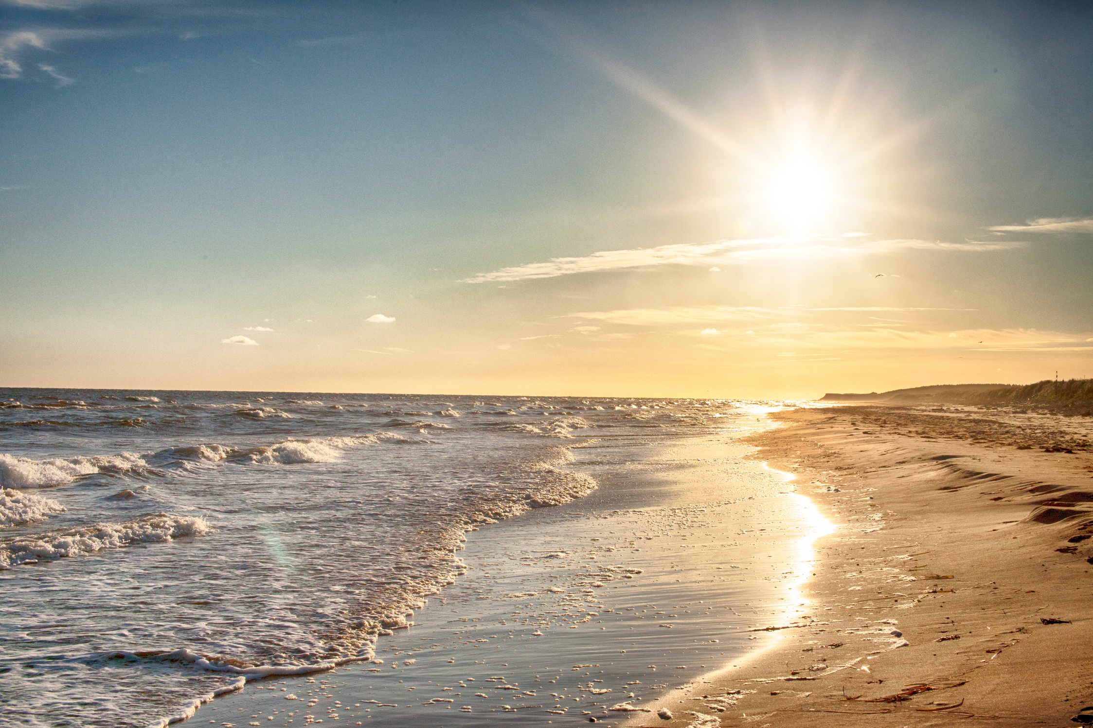 Sun shining over the beach